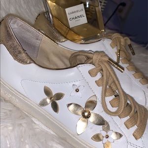 Gold and white Michael Kors Sneakers